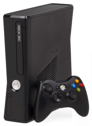 black Xbox 360 console with controller